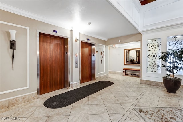 interior space with ornamental molding, elevator, and light tile patterned flooring