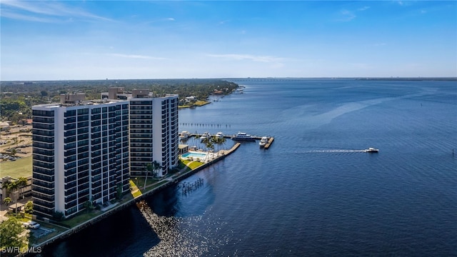 birds eye view of property featuring a water view