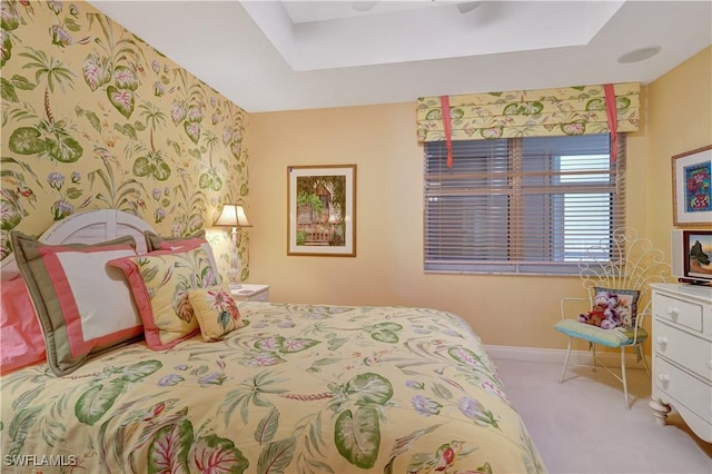 bedroom featuring ceiling fan and light colored carpet