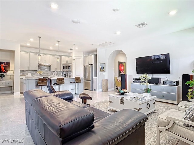 living room featuring light tile patterned floors