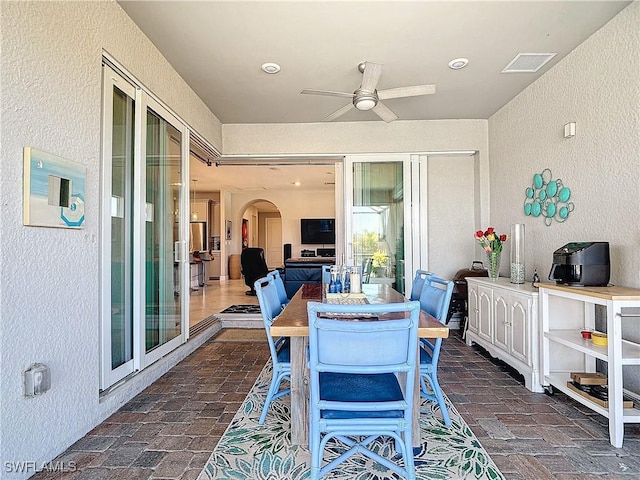 view of patio / terrace with ceiling fan