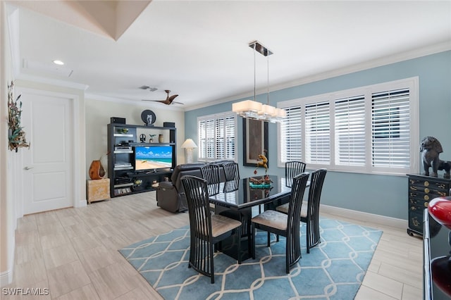 dining area with crown molding