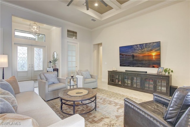 living room with french doors, coffered ceiling, ornamental molding, beamed ceiling, and a towering ceiling