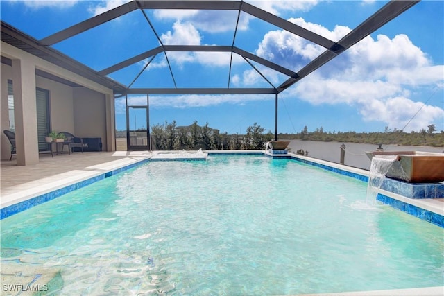 view of swimming pool with a lanai, a patio area, a hot tub, and pool water feature