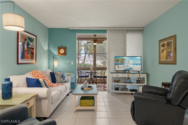 living room with light tile patterned floors and ceiling fan