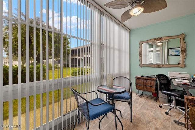 interior space featuring a healthy amount of sunlight and ceiling fan