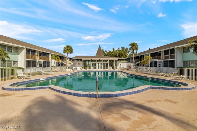 view of swimming pool featuring a patio