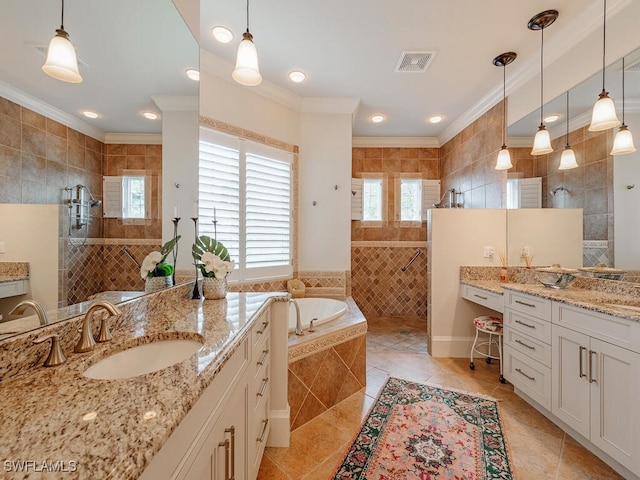 bathroom with crown molding, separate shower and tub, tile walls, vanity, and tile patterned flooring