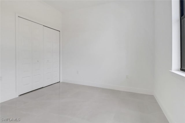 unfurnished bedroom featuring a closet