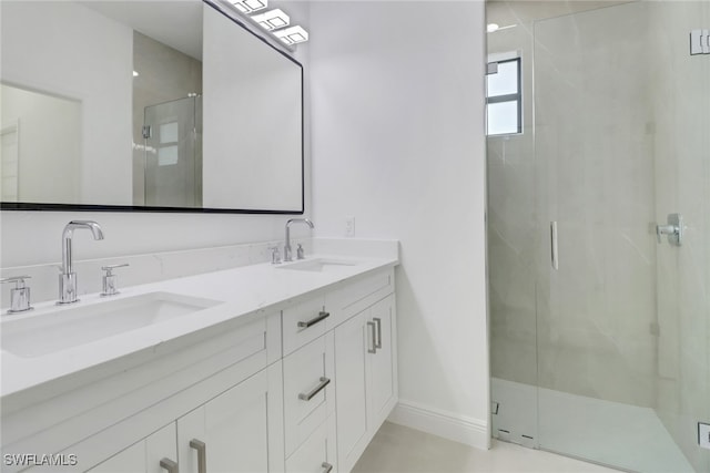 bathroom featuring vanity and walk in shower