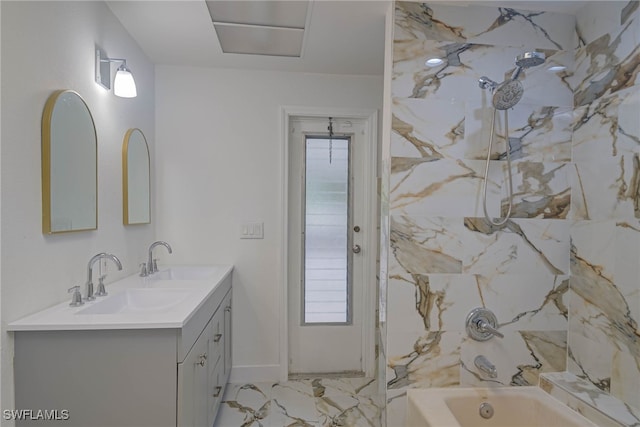 full bath with washtub / shower combination, marble finish floor, a sink, and double vanity