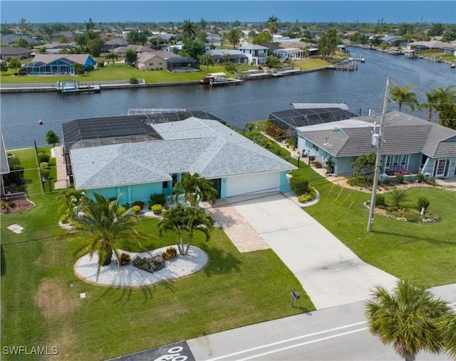 drone / aerial view featuring a water view