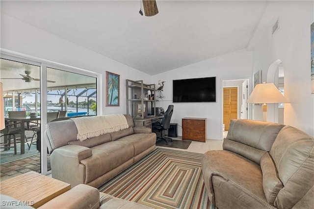 living room with vaulted ceiling and ceiling fan