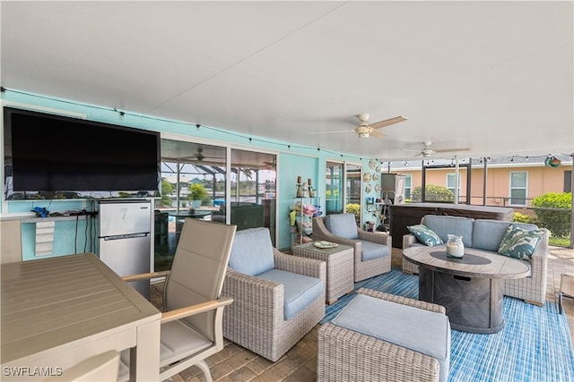 view of patio with an outdoor hangout area and ceiling fan