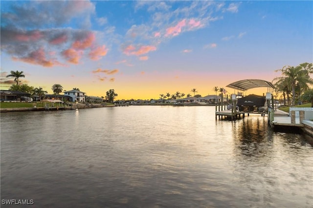 water view featuring a dock