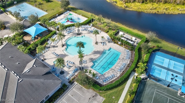 birds eye view of property featuring a water view