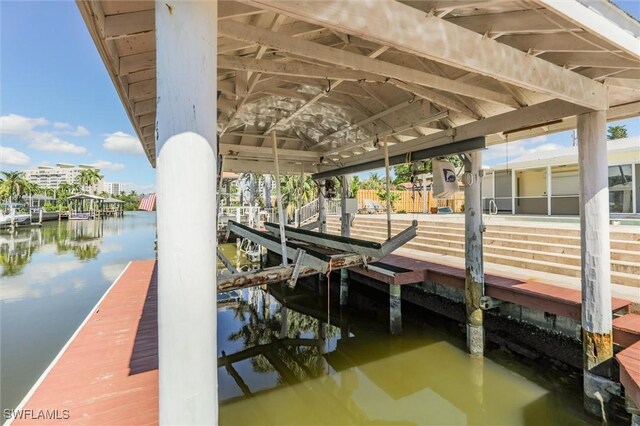 dock area featuring a water view