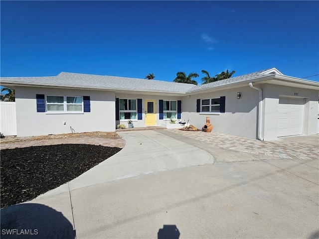 ranch-style house featuring a garage