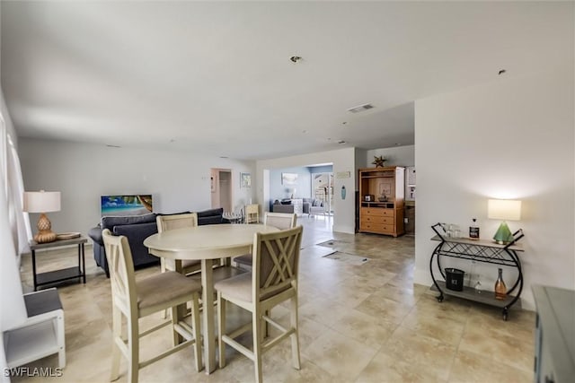 dining space with visible vents