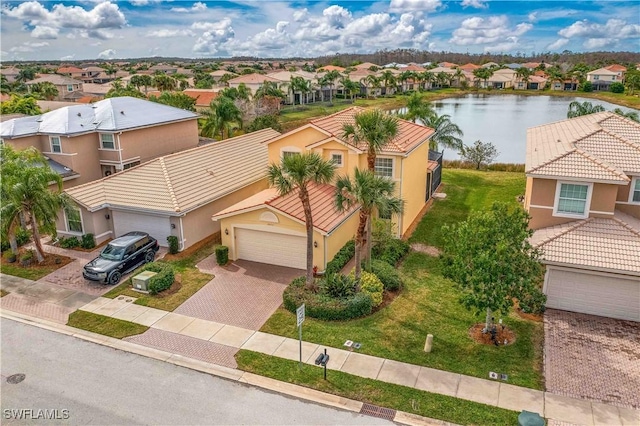 drone / aerial view featuring a water view