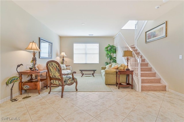 sitting room featuring light tile patterned floors