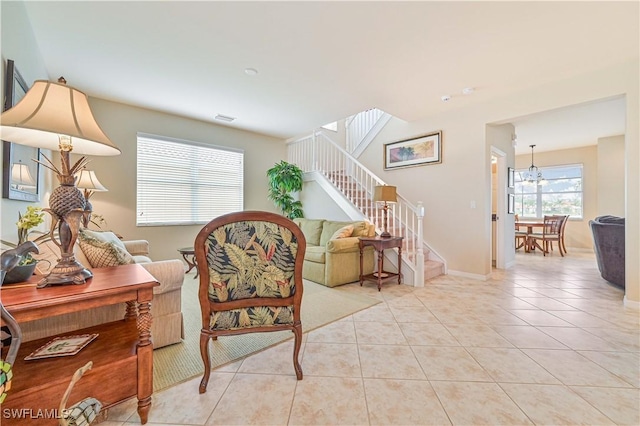 living room with light tile patterned flooring