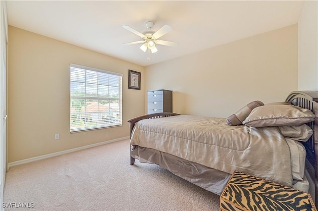 bedroom featuring ceiling fan and carpet flooring