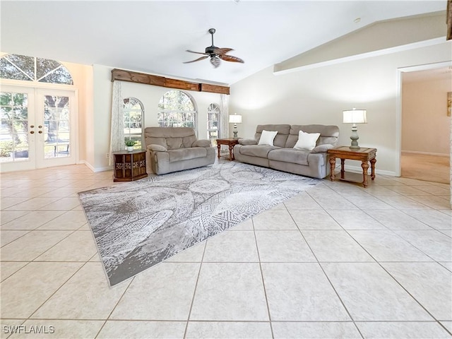 living room with light tile patterned flooring, vaulted ceiling, ceiling fan, and french doors