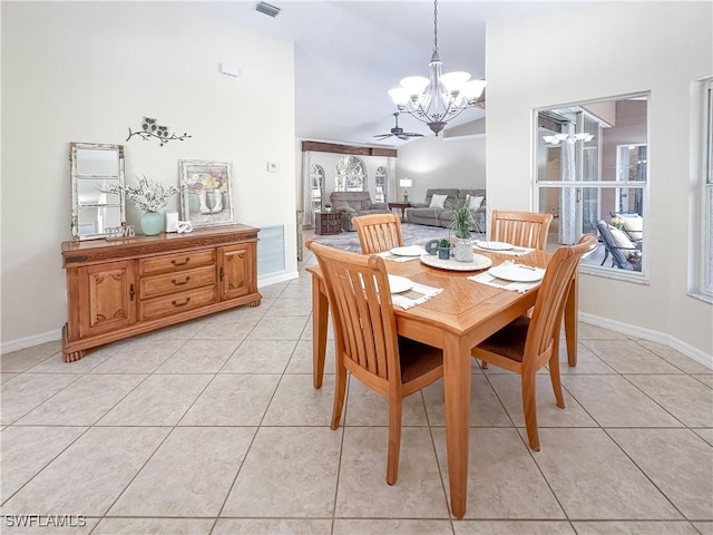 2910 2nd St NE, Naples, FL 34120 - dining room featuring a chandelier, light tile patterned floors, high vaulted ceiling, and baseboards