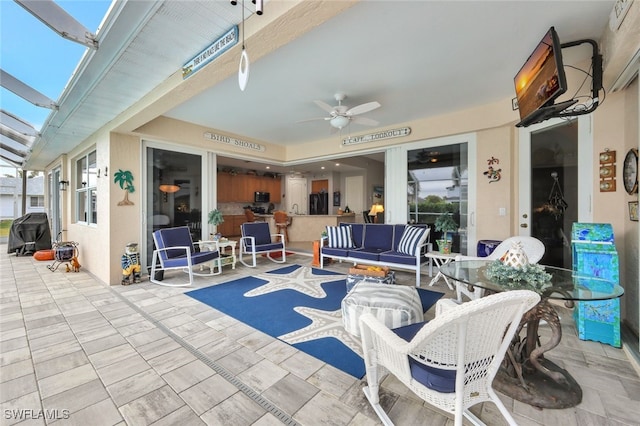 view of patio / terrace featuring outdoor lounge area and ceiling fan