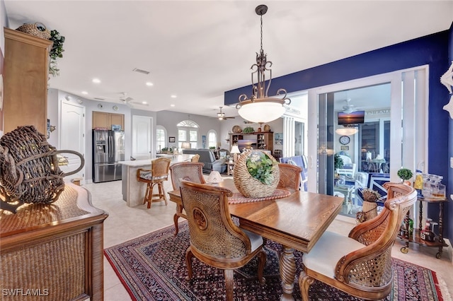 dining area with light tile patterned floors