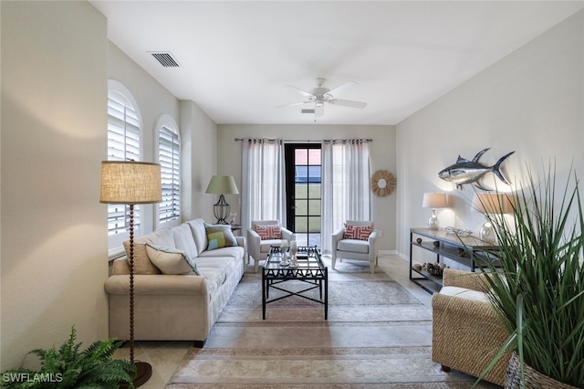 living room featuring ceiling fan