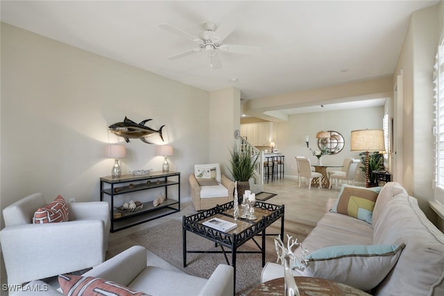 living room with ceiling fan