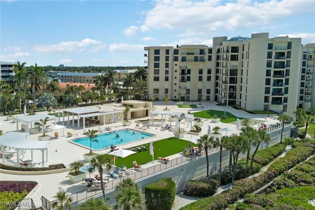 view of swimming pool featuring a pergola and a patio area