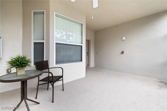 view of patio / terrace featuring ceiling fan