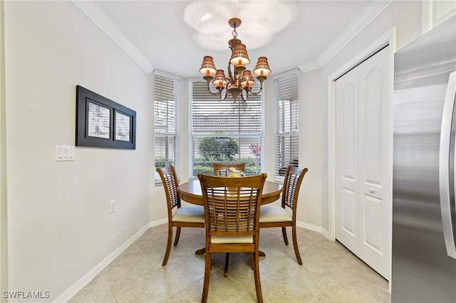 dining space featuring a notable chandelier, crown molding, and light tile patterned floors