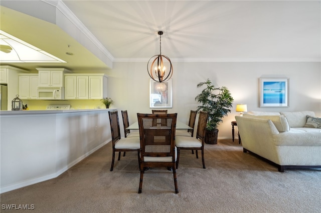 carpeted dining room with crown molding and a chandelier