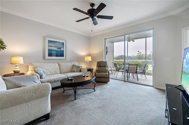 carpeted living room featuring crown molding and ceiling fan