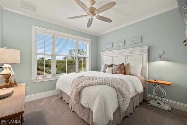 bedroom featuring crown molding, light colored carpet, and ceiling fan