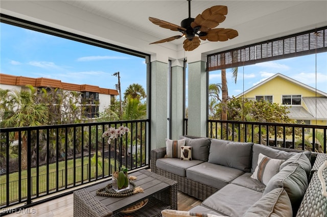 sunroom / solarium with ceiling fan