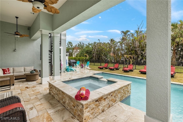 view of swimming pool with an in ground hot tub, outdoor lounge area, and a patio