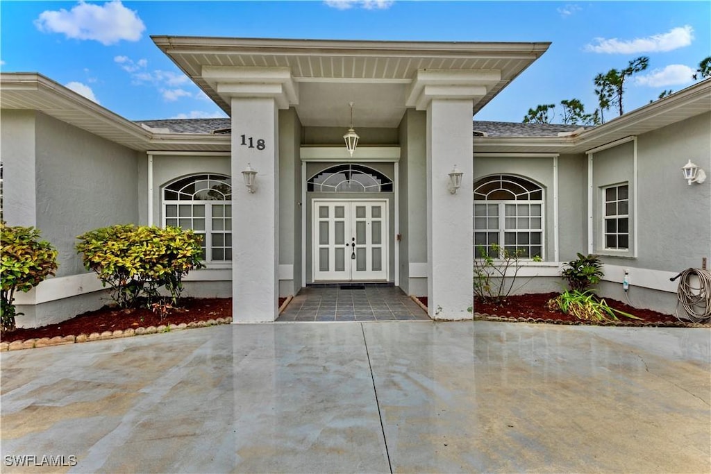 doorway to property with french doors