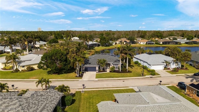 drone / aerial view featuring a water view