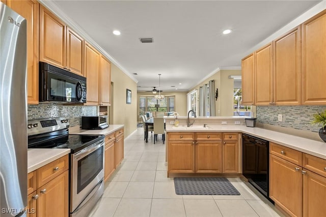 kitchen featuring light tile patterned flooring, black appliances, sink, kitchen peninsula, and crown molding