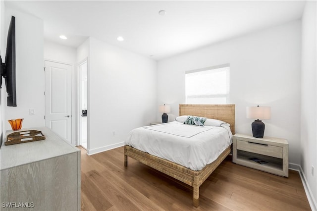 bedroom featuring light hardwood / wood-style flooring