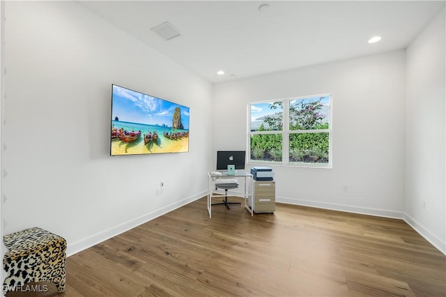 office with hardwood / wood-style floors