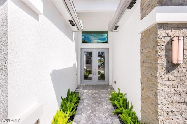 doorway to property with french doors