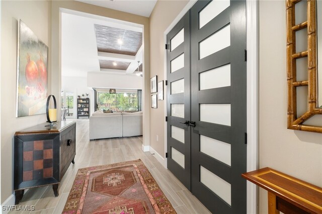 doorway to outside with light hardwood / wood-style flooring