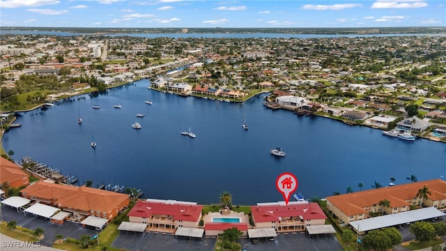 drone / aerial view with a water view