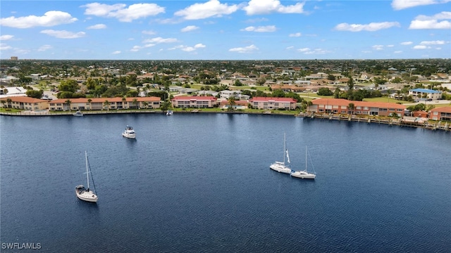 drone / aerial view with a water view